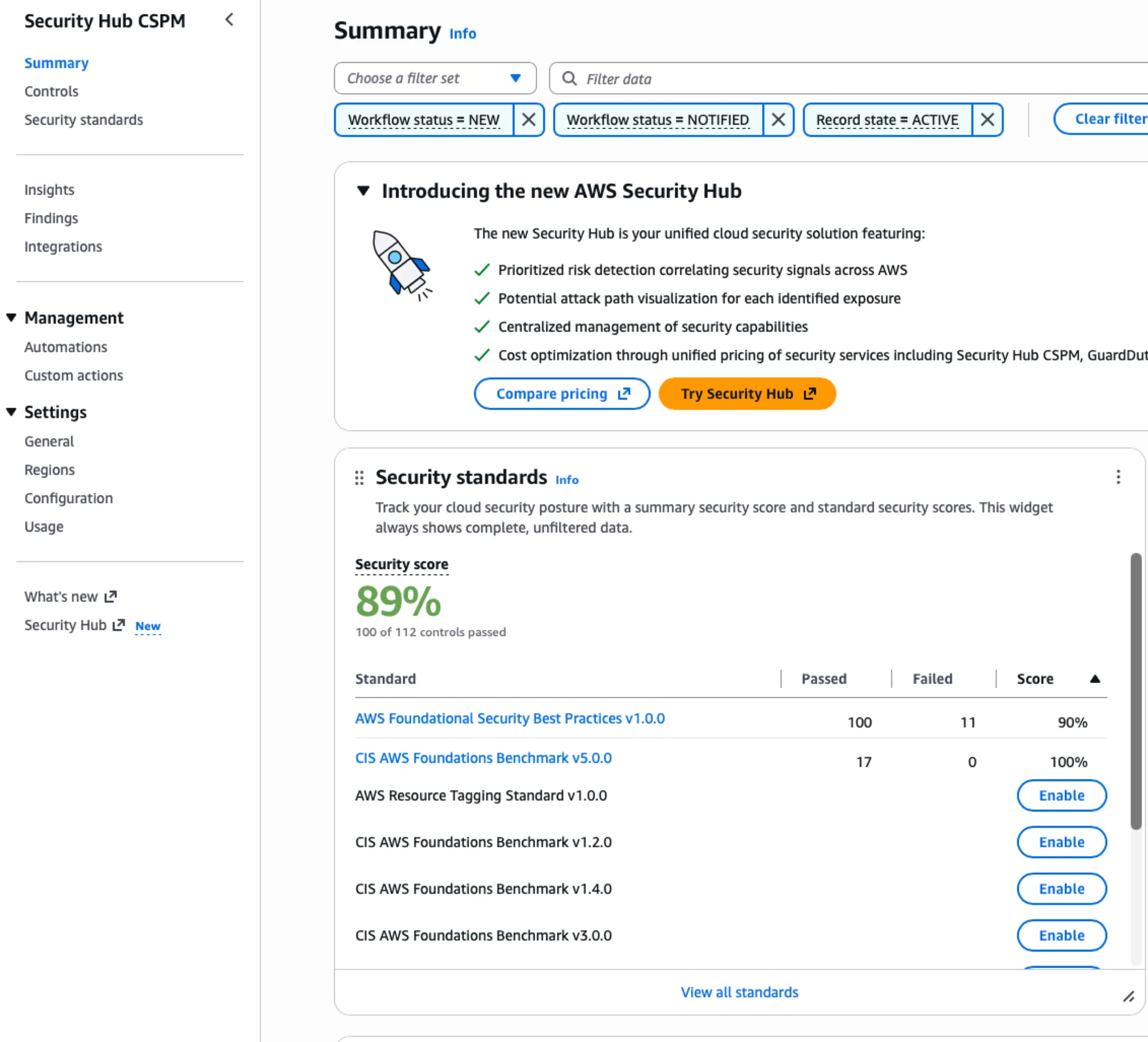 AWS Security Hub summary showing an 89 percent security score with 100 of 112 controls passed. AWS Foundational Security Best Practices scores 90 percent and CIS AWS Foundations Benchmark v5.0.0 scores 100 percent, while other standards sit behind one-click Enable buttons.